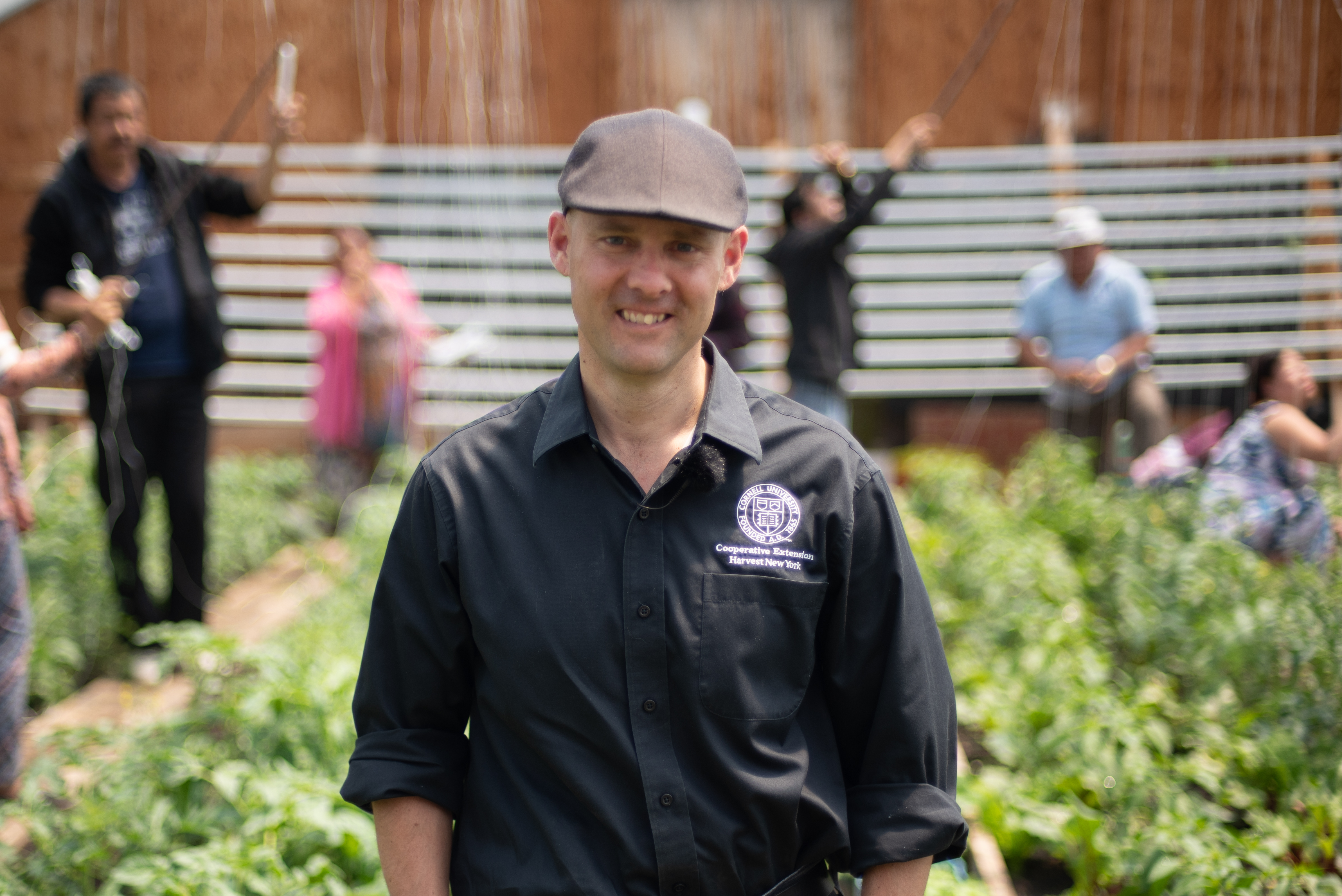 Judson Reid in a greenhouse