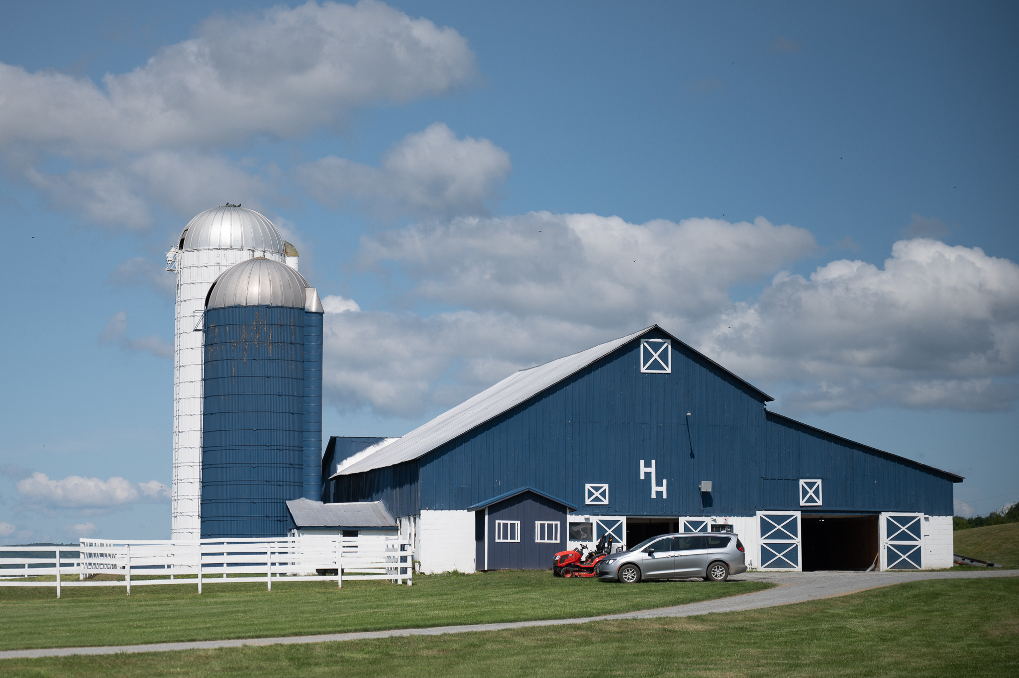 A blue farm building