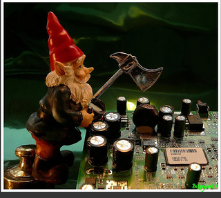 A small gnome standing at a motherboard (Phil's profile photo of choice, he is not actually a gnome)