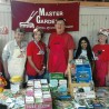 Master Gardener Volunteers staffing information table at Adirondack Harvest Festival 2024.