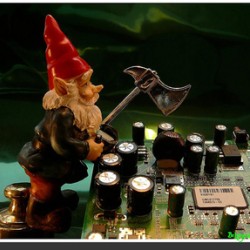 A small gnome standing at a motherboard (Phil's profile photo of choice, he is not actually a gnome)