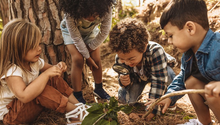 Diverse group of kids exploring nature