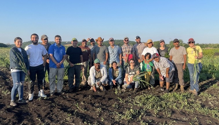 Students with Spanish-speaking farmers in Orange County.