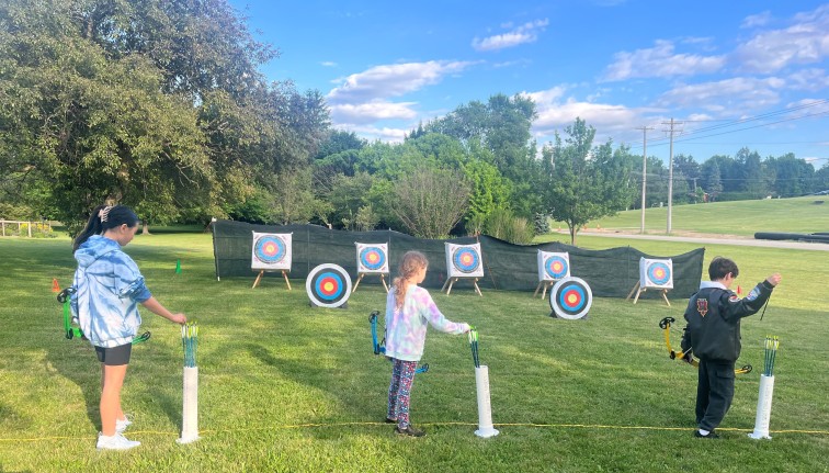Children participating in CCE Albany 4-H archery. 