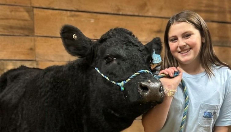 4-Her and her cow.