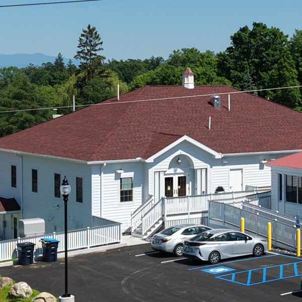 building with cars in front