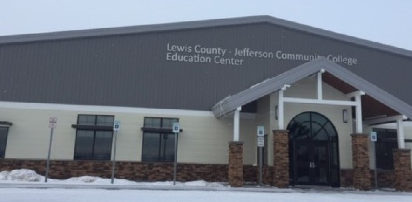 a large building with Lewis County-Jefferson Community College Education Center on the face