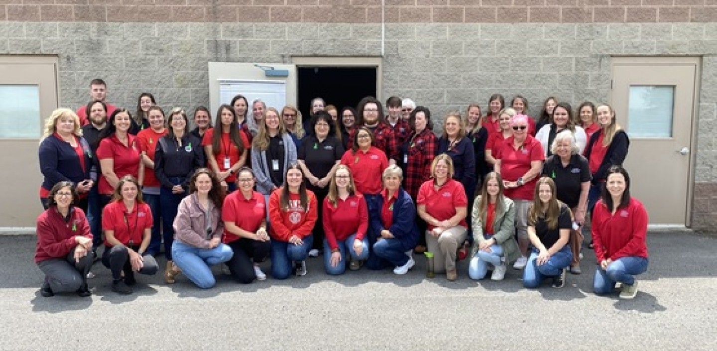 Group picture of CCE Oneida staff outside from 2023
