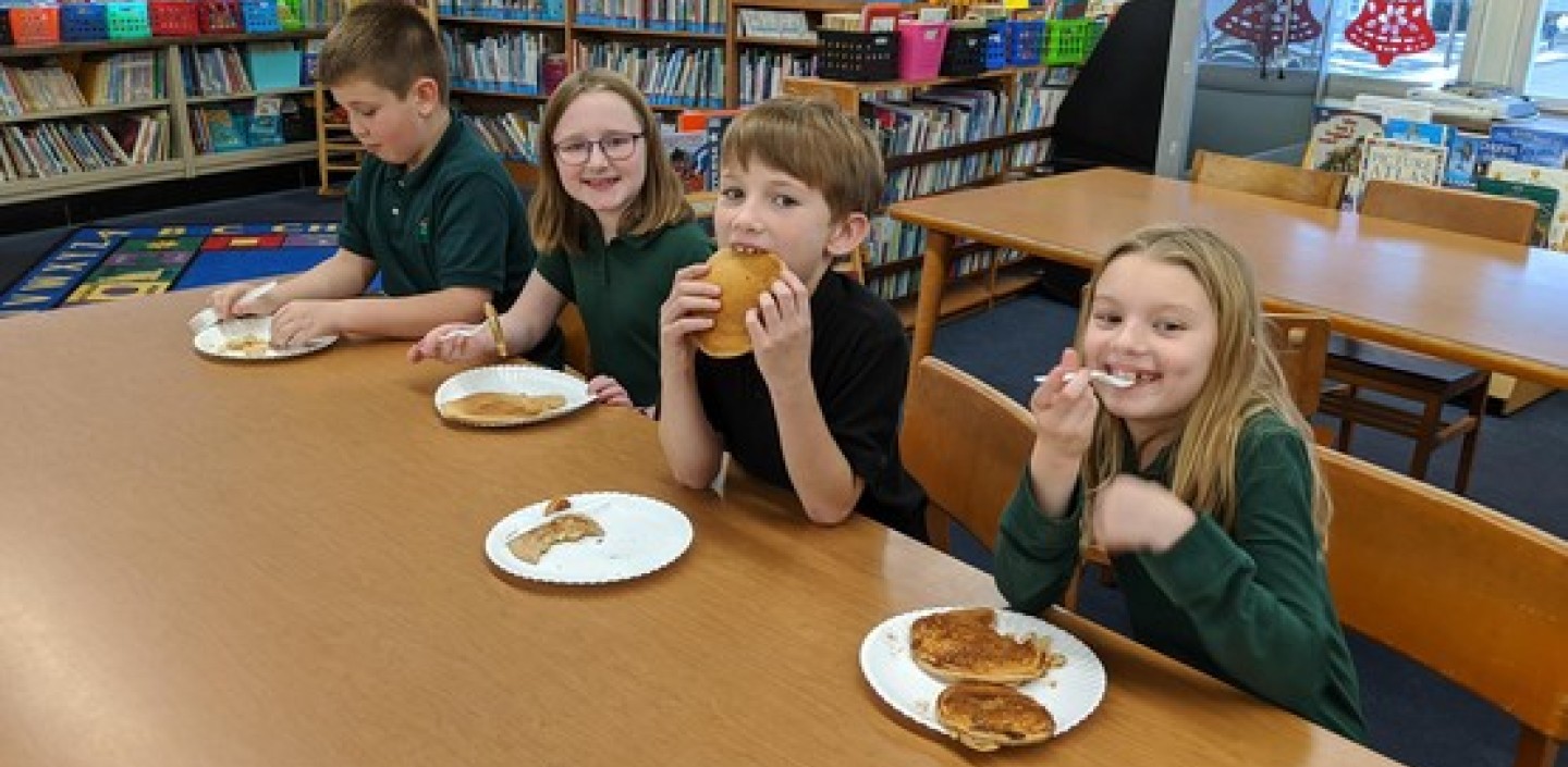 Youth eating pankcakes