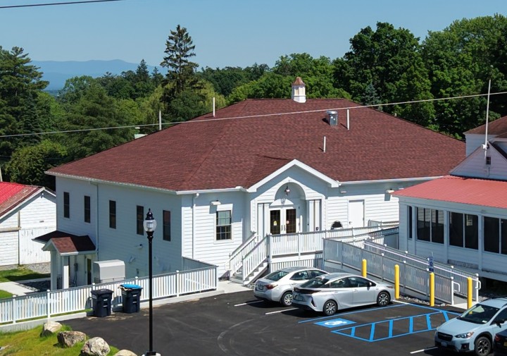 building with cars in front
