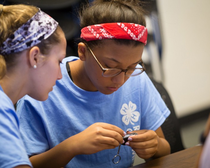 4-H students working on a drone 