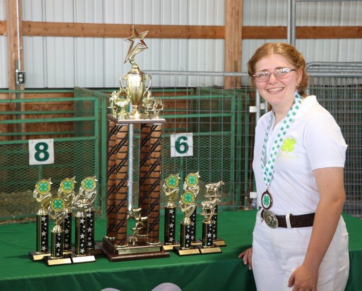 2025 Master Showmanship winner, Ella Maxwell, with the Master Showmanship trophy at the 4-H Award Ceremony at the Ulster County Fair.