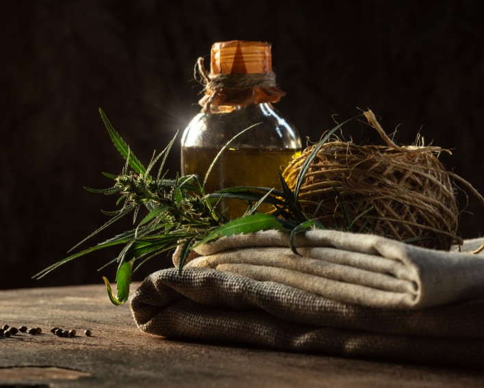 Composite photo of Cannabis sativa flower, oil, rope, textiles, and seed