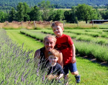 Lindsey and her children in a field of lavendar