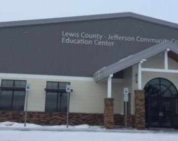 a large building with Lewis County-Jefferson Community College Education Center on the face