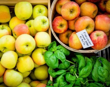 An assortment of apples and other produce