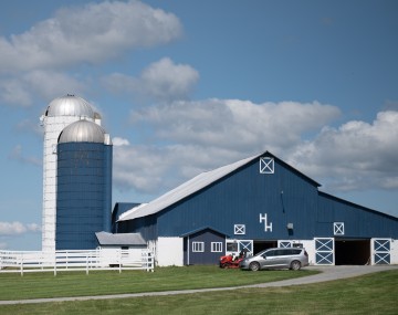 A blue farm building