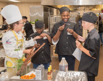 students and chef during culinary training