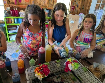 kids at camp doing tie dye