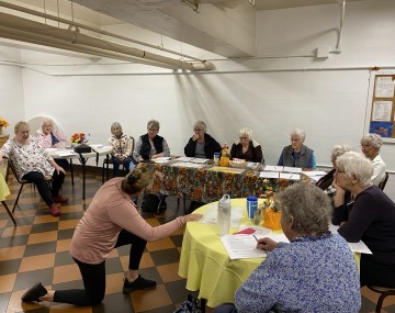 Senior citizens learning about better balance
