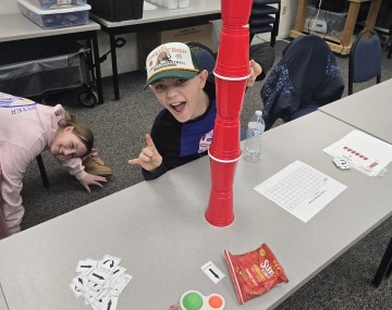 kids playing with cups 