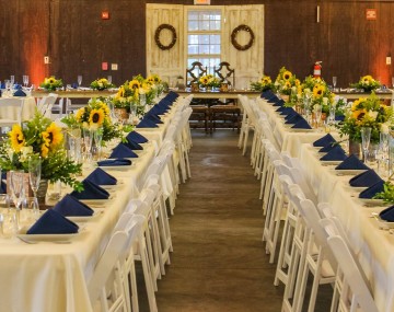 tables decorated with sunflower centerpieces