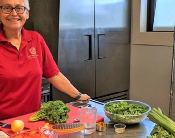A CCE Broome staff member preparing a nutritious recipe
