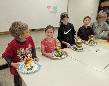 kids with veggie towers