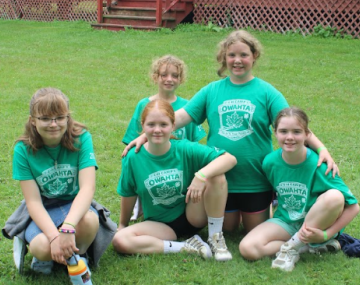 girls with camp shirts on